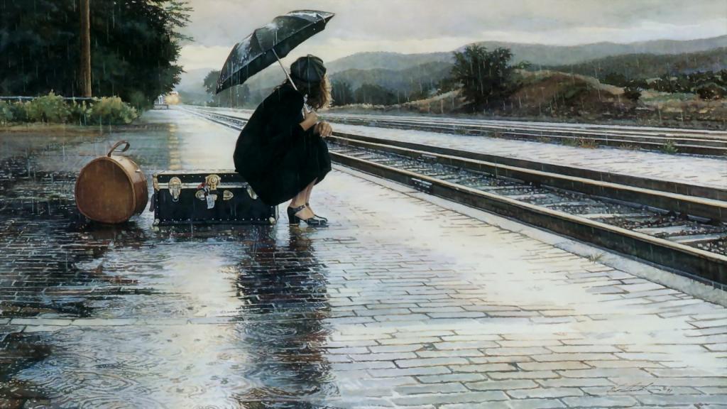 Девушка одна под дождем.
